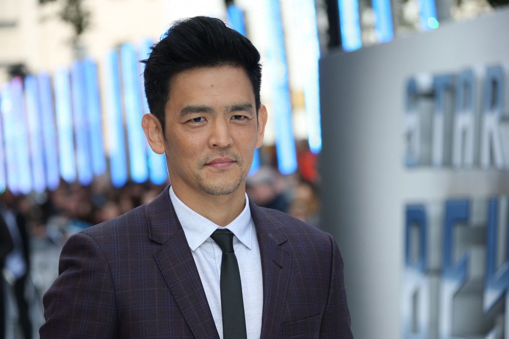 Actor John Cho poses for photographers upon arrival at the premiere of the film 'Star Trek Beyond' in London, Tuesday, July 12, 2016. (Photo by Joel Ryan/Invision/AP)